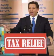  ?? DOUG ENGLE — OCALA STAR-BANNER VIA AP ?? Florida Gov. Ron DeSantis speaks during a news conference at MVP Appliances in Ocala on Wednesday. DeSantis mentioned Disney and how it will be no longer be self governing “because there's a new sheriff in town.”