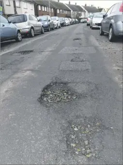  ??  ?? Potholes on Oxford Road