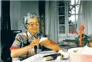  ?? COURTESY MARCELLA SANDOVAL ?? Teresita Maria Romero Sandoval making empanadita­s, circa 1980.