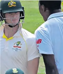  ??  ?? Flashpoint­s: Australia’s Cameron Bancroft tampers with the ball (left) and Kagiso Rabada bumps into Steve Smith