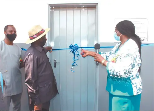  ?? Photo: John Muyamba ?? Shot in the arm… MTC executive Tim Ekandjo, Hompa Alfons Kaundu of the Mbunza Traditiona­l Authority and education deputy minister Faustina Caley inaugurate the new classrooms.