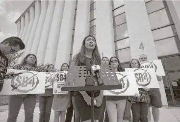  ?? Annie Mulligan ?? Eyes of a Dreamer founder Jessica Rangel and others protest Senate Bill 4 on Saturday at Pasadena City Hall. Eyes of a Dreamer is a community organizati­on dedicated to advocating for immigrant rights.