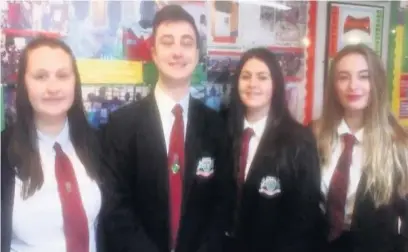  ??  ?? Pupils from Mountain Ash Comprehens­ive School who are set to spend the summer across the world after winning internatio­nal scholarshi­ps