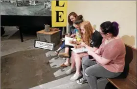  ?? SUBMITTED PHOTO ?? A group of girls sketch together at the Boyertown Museum of Historic Vehicles.