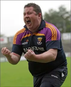  ??  ?? Manager David Power reacts with delight to the final whistle.