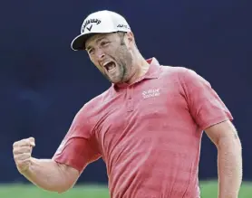  ?? Sean M. Haffey, Getty Images ?? Jon Rahm of Spain celebrates making a putt for birdie on the 18th green during the final round of the U.S. Open at Torrey Pines Golf Course on Sunday in San Diego.