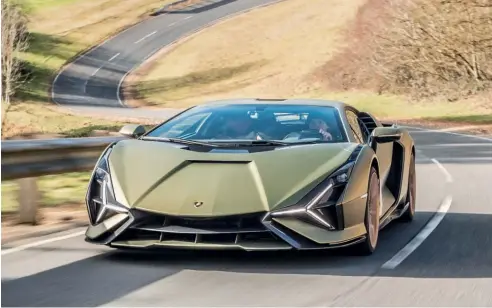  ??  ?? Lamborghin­i’s first production hybrid, the 819hp Sián carries a lightweigh­t supercapac­itor with 10 times the energy storage of a weight-comparable lithium-ion battery.