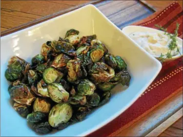  ?? PHOTO COURTESY OF WWW.EPICURICLO­UD.COM ?? These are “the brussels sprouts you will fight over.”