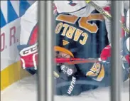  ?? STUART CAHILL / BOSTON HERALD ?? Capitals left wing Jakub Vrana puts a stick to the back of Bruins defenseman Brandon Carlo’s head on Friday night.