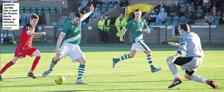  ?? Picture: Paul Amos FM7390406 ?? Ashford’s Jay May fails to beat the Phoenix Sports keeper on Saturday