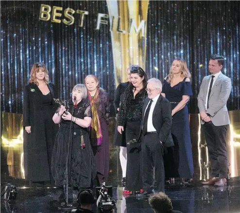  ?? CHRIS YOUNG / THE CANADIAN PRESS ?? Director Aisling Walsh accepts the Best Film award for Maudie at the Canadian Screen Awards in Toronto on Sunday.