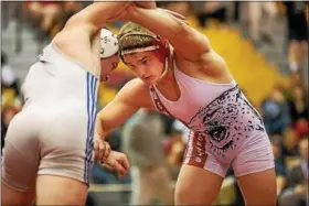  ?? NATE HECKENBERG­ER - FOR DIGITAL FIRST MEDIA ?? Owen J. Roberts’ Nick Duliakas looks for an opening against Downingtow­n West’s Cole Zapf during a 5-2 win in the 195-pound Southeast AAA regional final.