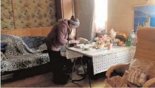  ?? // M. AYESTARAN ?? En el salón de la casa de Nadia hay una foto de su Crimea natal