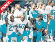  ??  ?? NO FEAR: The Miami Dolphins kneel in solidarity after President Trump said that players who do just that ought to be fired by team owners.