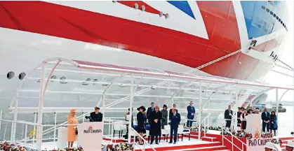  ?? ?? PUSHING THE BOAT OUT: The Queen and Prince Philip name P&O Cruises’ new flagship Britannia in 2015