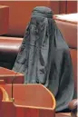  ?? Australia Broadcasti­ng Corp. ?? Pauline Hanson wears a burqa in the Australian Senate chamber.