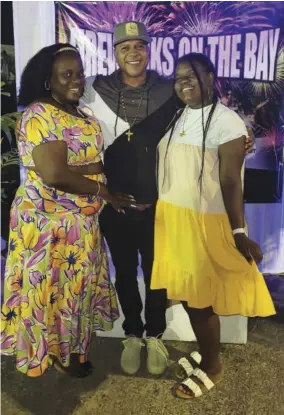  ?? ?? Kasheka Grant’s end of year celebratio­n with parents Kevin Grant and Cyreta Henry at Ocho Rios Bay Beach.