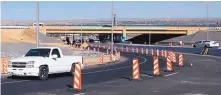  ?? ADOLPHE PIERRE-LOUIS/JOURNAL ?? Work at the busy Rio Bravo-Interstate 25 interchang­e nears completion Friday. Officials marked the occasion with a ribbon-cutting ceremony in the shade of the underpass.