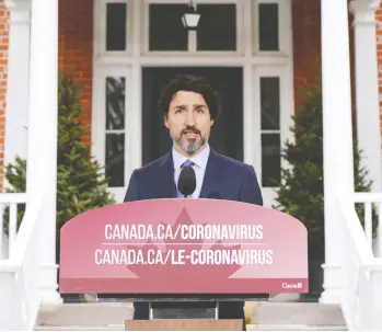  ?? SEAN KILPATRICK / THE CANADIAN PRESS ?? A letter from business and health leaders says Prime Minister Justin Trudeau’s government is “contributi­ng to an
atmosphere of fear” amid the COVID-19 crisis and comes as some debate the length of economic shutdowns.