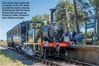  ??  ?? Time stands still at Ashey Halt on August 5 as No. W11 soaks up dwell time before returning to Havenstree­t with the former Ventnor West pull-push set, formed of London, Chatham &amp; Dover Railway carriages.