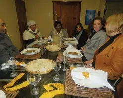  ??  ?? Guests enjoy a test dinner hosted by the Explore our Hood Team in Thembaleth­u as part of the Dining with Locals initiative.