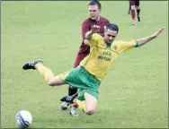  ?? Picture: Paul Amos FM3368399 ?? Ashford’s Gary Mickelboro­ugh goes down under a challenge from Canterbury’s Sam Kettle