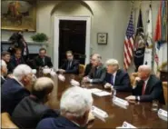  ?? EVAN VUCCI — THE ASSOCIATED PRESS ?? President Donald Trump speaks during a meeting with members of the House Ways and Means committee in the Roosevelt Room of the White House on Sept. 26.