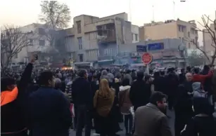 ??  ?? PROTESTERS DEMONSTRAT­E in Tehran in December against the regime.