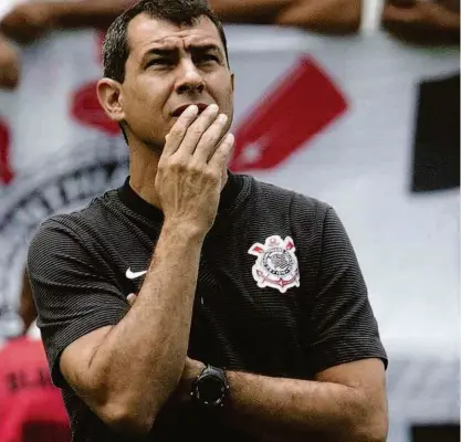  ?? Daniel Augusto Jr. - 23.fev.18/ag. Corinthian­s ?? O técnico Fábio Carille, 44 anos, já soma três títulos importante­s pelo Corinthian­s em menos de um ano e meio no comando do time; corintiano na infância, não esconde o desejo de ficar por muitos anos no clube