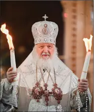  ?? (AP/Russian Orthodox Church Press Service/Sergei Vlasov,) ?? Russian Orthodox Church Patriarch Kirill conducts an Easter weekend service April 23 at the Christ the Savior Cathedral in Moscow. “We don’t want to fight anyone. Russia has never attacked anyone,” Kirill said Wednesday at the end of a Divine Liturgy.