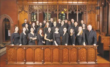  ?? Institute of Sacred Music / Contribute­d photo ?? The Schola Cantorum with David Hill, right.