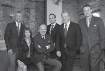  ??  ?? Men in Suits plays the Orbit Room Friday as part of Canadian Music Week. The group of Bay St. executives, which has raised more than $1 million for charity, includes, from left, Gerry Throop, Trish Fondberg, Don Tapscott, Vince Mazza, Jim Hardy and...