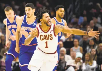  ?? Jason Miller / Getty Images ?? The Cavs’ Derrick Rose reacts after being called for a foul in the first half against the Knicks.