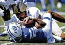  ?? BEN MARGO/ASSOCIATED PRESS ?? GSU quarterbac­k Quad Brown (4) completed 12 of 20 passes for 129 yards — his second-lowest total since becoming the starter — and one touchdown and was sacked three times.