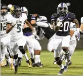  ?? CONTRIBUTE­D BY LOURDES M ?? Cedar Ridge’s Simi Bakare runs for one of his 29 touchdowns this past season against Akins in the Class 6A, Division I bi-district playoff. The running back is headed to Missouri.