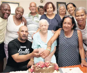  ?? | DOCTOR NGCOBO African News Agency (ANA) ?? Daily News subscriber Alice Fernandez celebrated her 100th birthday yesterday with friends and family at Newlands East. She is pictured with three generation­s, her daughters, grandsons and great-grandson.