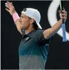  ??  ?? Frenchman Lucas Pouille celebrates his victory over the higher-ranked Milos Raonic in an Australian Open quarterfin­al in Melbourne.