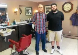  ?? PEG DEGRASSA — DIGITAL FIRST MEDIA ?? Bob Dolente, left, owner of Robert Vincent Hair Designers, 434 MacDade Blvd., Folsom, stands beside barber Ron Sciocchett­i, inside the barber shop that features haircuts for every taste for clients of every age. For an appointmen­t, call 610-237-8868.