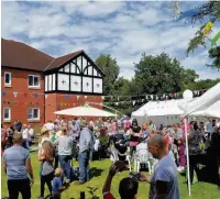  ??  ?? ●● Hundreds enjoyed the summer fair at Rossendale Trust in Sutton