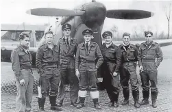  ?? ?? Bill Warwick in 2012 with his air force logbook, and third from left in front of a Spitfire during the war.