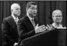  ?? RICH PEDRONCELL­I / AP ?? California Attorney General Xavier Becerra, center, f lanked by Gov. Jerry Brown, left, and California Air Resources Board Chair Mary Nichols, says his job entails more than suing the Trump administra­tion.