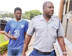  ?? ?? City Football Academy owner Agripa Guti arrives at the Harare Magistrate­s Court for allegedly defrauding several people after assuring them that he was a recruiting agent for Manchester City Football Club yesterday