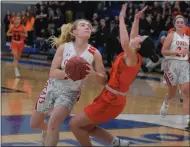  ?? AUSTIN HERTZOG - MEDIANEWS GROUP ?? Pennsbury’s Bella Arcuri takes a charge against Owen J. Roberts’ Olivia LeClaire.