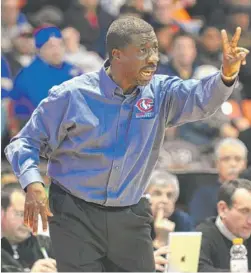  ?? | PATRICK GLEASON/FOR SUN-TIMES MEDIA ?? Curie coach Mike Oliver and his players still don’t know whether they will be allowed to keep the city title they won Friday against Young.