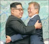  ?? AFP ?? North Korean leader Kim Jong Un and South Korean President Moon Jae-in at the truce village of Panmunjom. ■