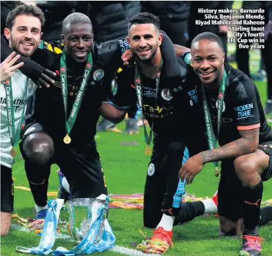  ??  ?? History makers: Bernardo
Silva, Benjamin Mendy, Riyad Mahrez and Raheem Sterling toast
City’s fourth EFL Cup win in
five years