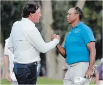  ?? ASSOCIATED PRESS FILE PHOTO ?? Phil Mickelson, left, and Tiger Woods will compete in a second made-for-TV golf match to raise money for COVID-19 relief.