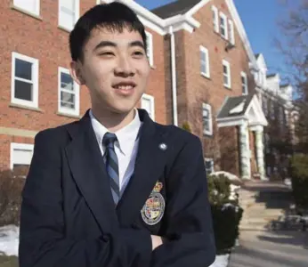  ?? ANDREW VAUGHAN/THE CANADIAN PRESS ?? Evan Xie, who attends King’s-Edgehill School in Windsor, N.S., memorized a random number with 1,180 digits.