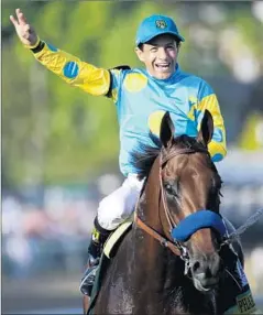  ?? Matt Slocum
Associated Press ?? VICTOR ESPINOZA says he doesn’t feel any extra pressure riding American Pharoah in pursuit of a Triple Crown.