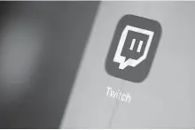  ?? AFP-Yonhap ?? Twitch’s logo is seen on a tablet screen in this 2019 file photo.
